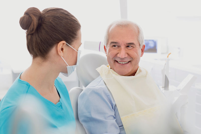 dental patient smiling after procedure 2 1